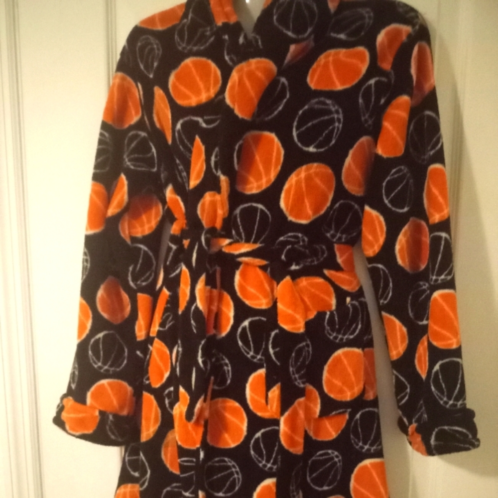 A boy robe in black and Orange